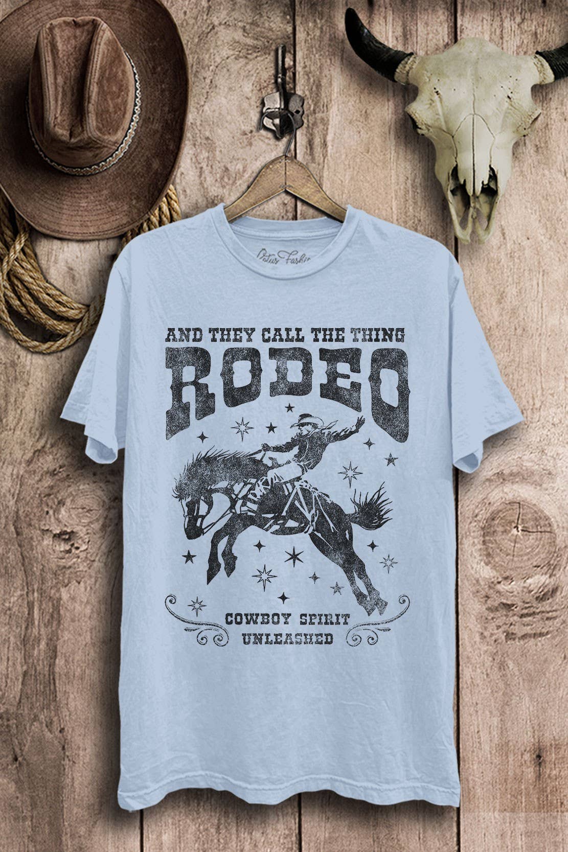 Lotus Fashion Collection - Wholesale Screen Printed T-Shirt - Women's - And They Call The Thing Rodeo Western Graphic Top1