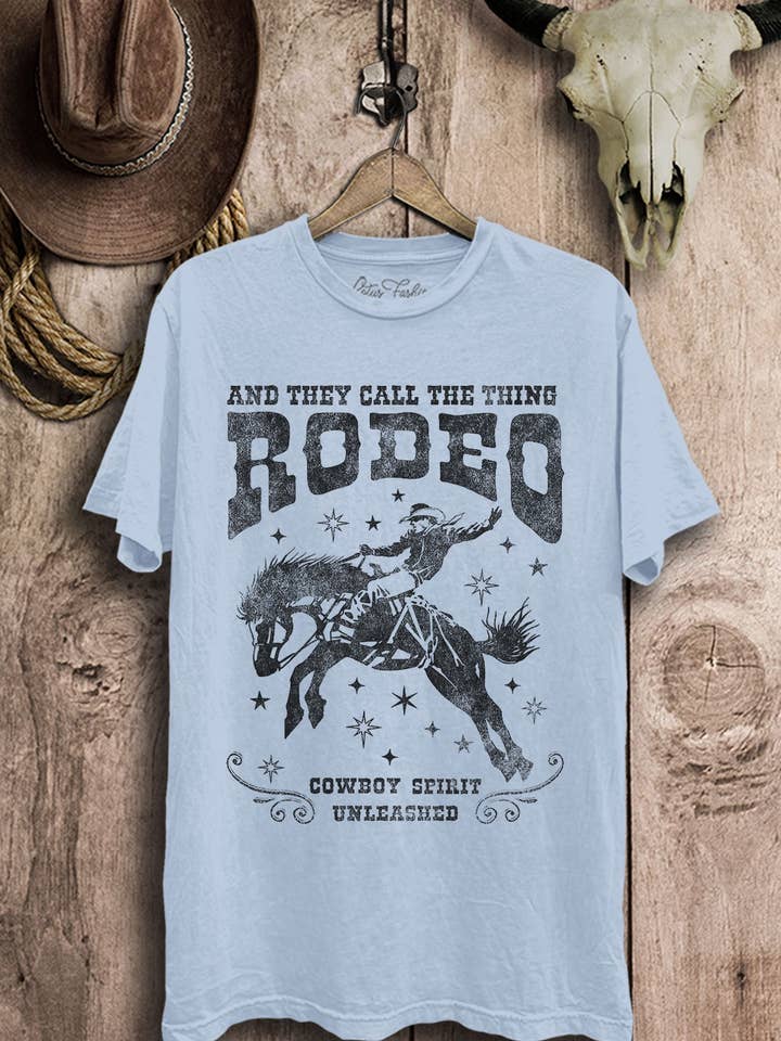 Lotus Fashion Collection - Wholesale Screen Printed T-Shirt - Women's - And They Call The Thing Rodeo Western Graphic Top1