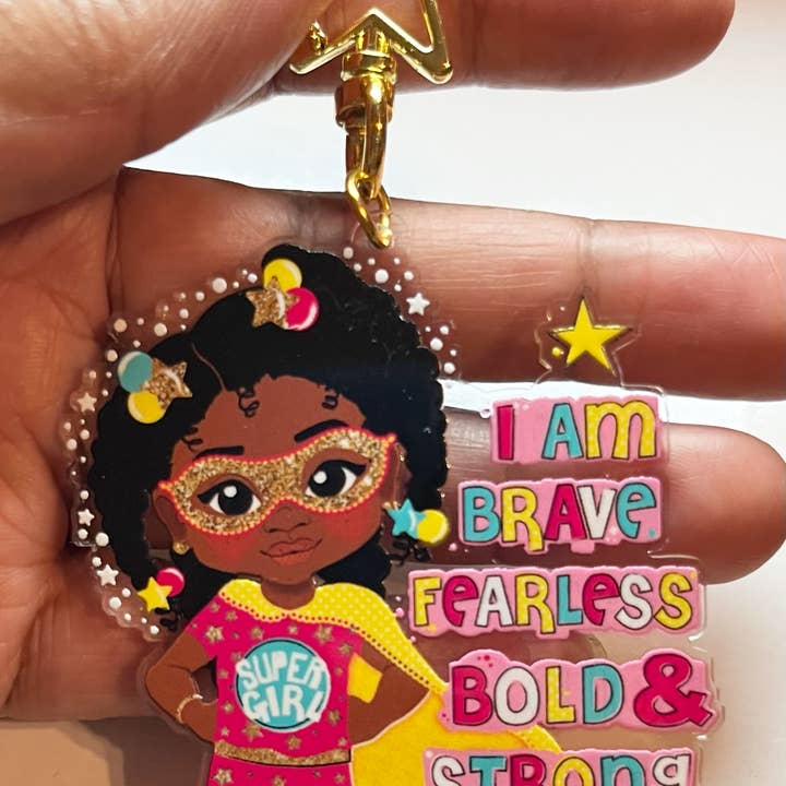 Black Girl Superhero Keyring – Empowering Recycled Acrylic Bag Charm for Kids | Afro Girl Keychain by Fefus Designs for wholesale by Fefus Designs