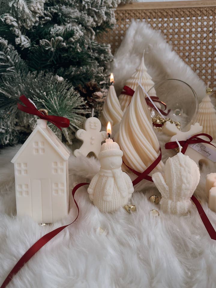 Adorable Knitwear Snowman Novelty Candle for wholesale by Hi Sunday Collective