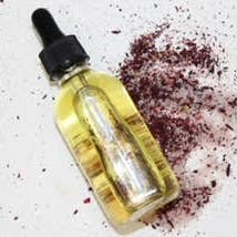 Huile pour le corps/massage à la lavande et à l'hibiscus pour la vente par Meraki Body Blends