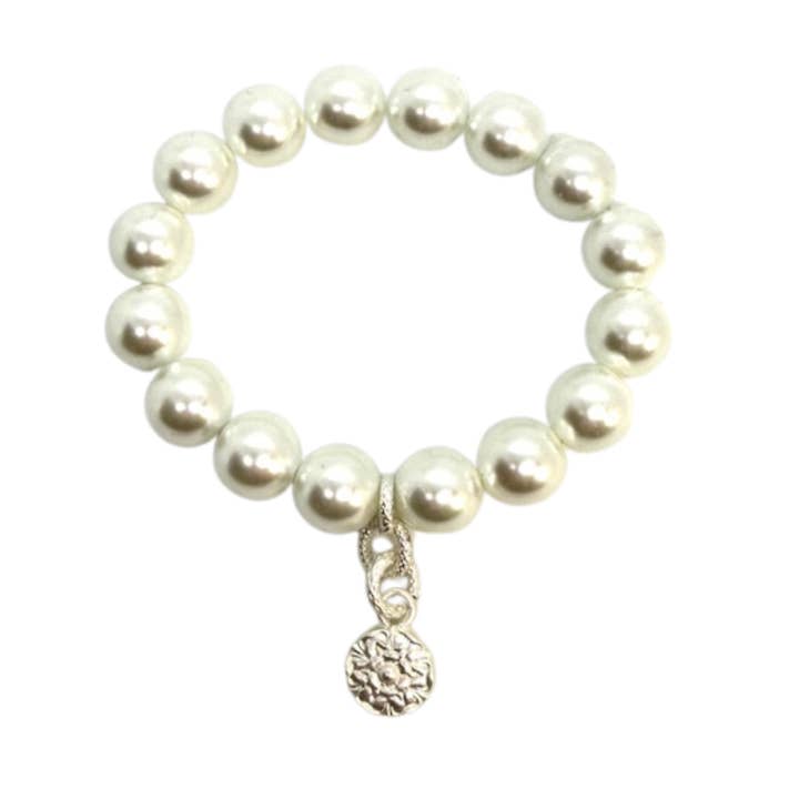 White Pearl Stretch Bracelet With Matte Silver Flower Charm for wholesale by Deborah Grivas Designs