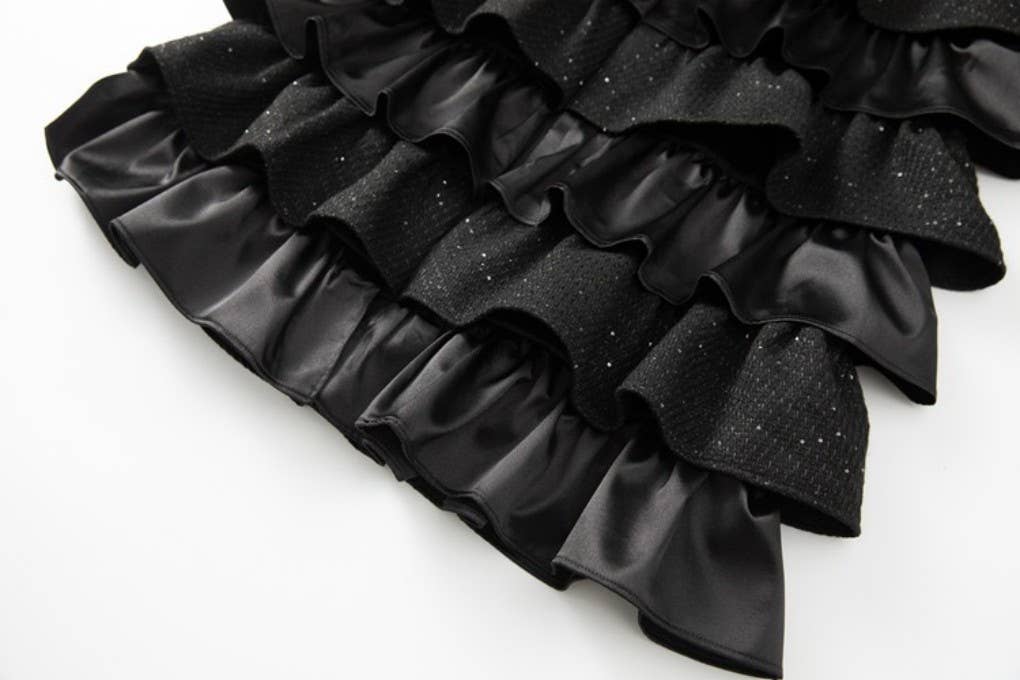 Negro CT110L Rompevientos de Pastel con Volantes y Borlas Hechas a Mano de venta al por mayor en Faire6