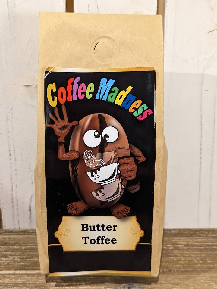 Café moulu aromatisé au beurre et au caramel, sac de 12 oz pour la vente par Coffee Madness