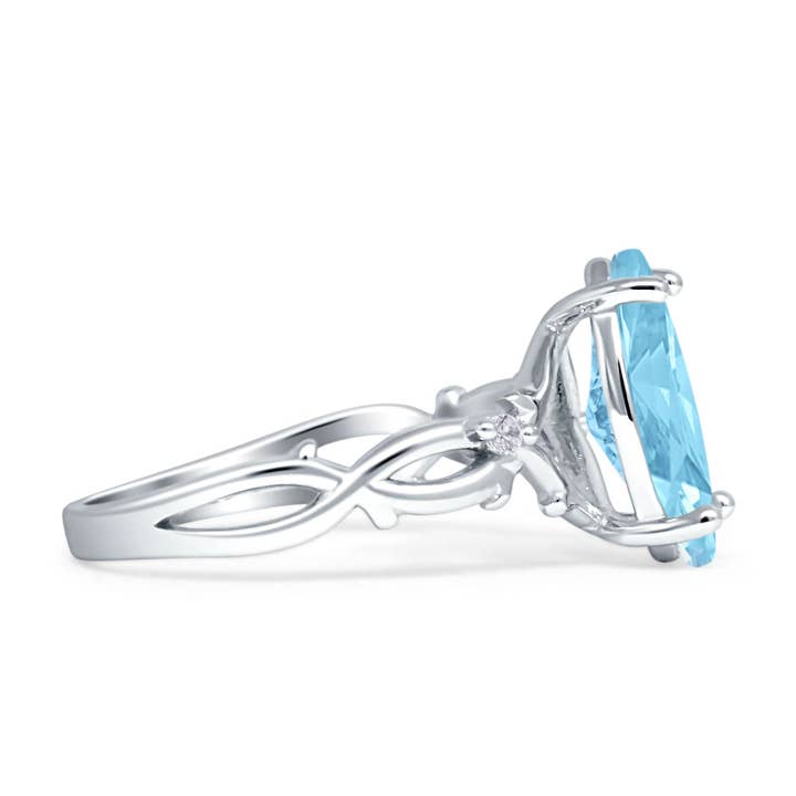 Marquise Split Shank Infinity Twisted Ring Aquamarine CZ for wholesale on Faire1