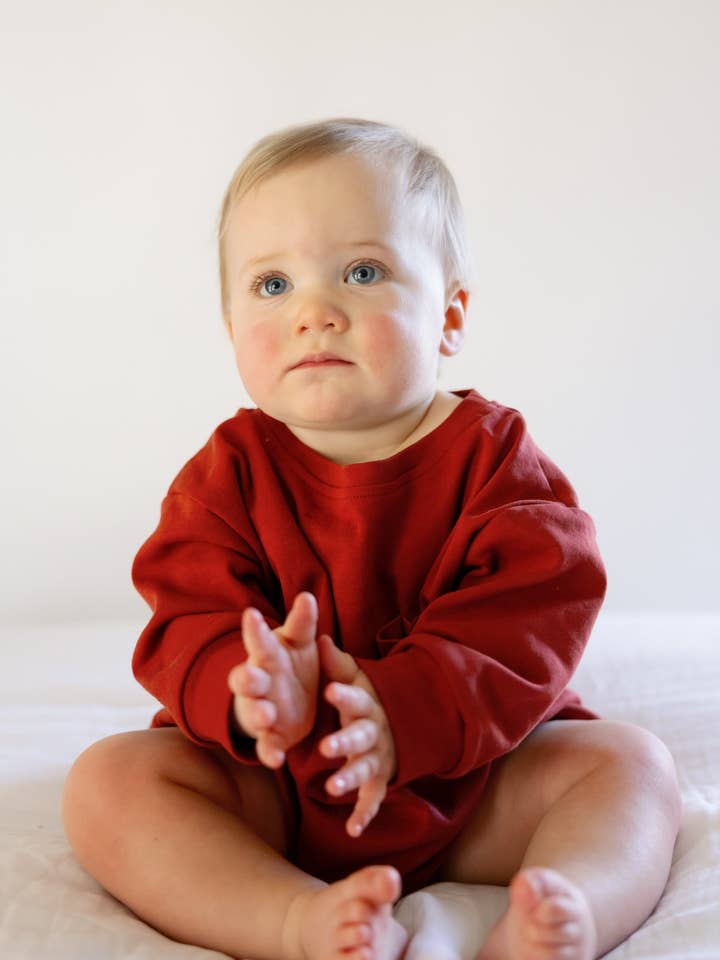 Long Sleeve Baby T-Shirt Romper in Brick for wholesale by Winnie + Crew