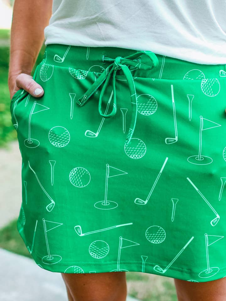 grün On Par Golf-Skort für den Großhandel auf Faire0