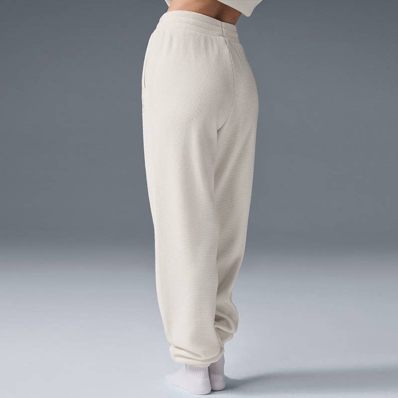 WONDERXFANS - Wholesale Lounge joggingbroek/joggingbroek - Dames - Broek met losse pasvorm en hoge taille van wafelstof met omgeslagen pijpen.4