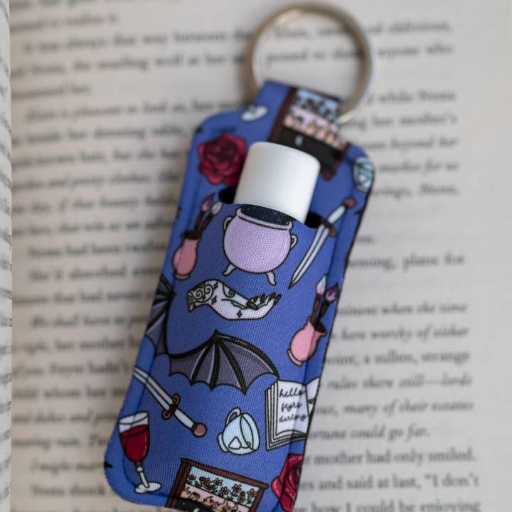 Bookish Fantasy Fairy Chapstick Holder Keychain for wholesale by Wicked Creatiff