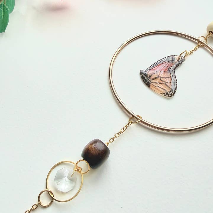 D. Prince Designs - Wholesale Suncatcher - Handmade + Hand-Illustrated Monarch Butterfly Suncatcher with Wood Beads1