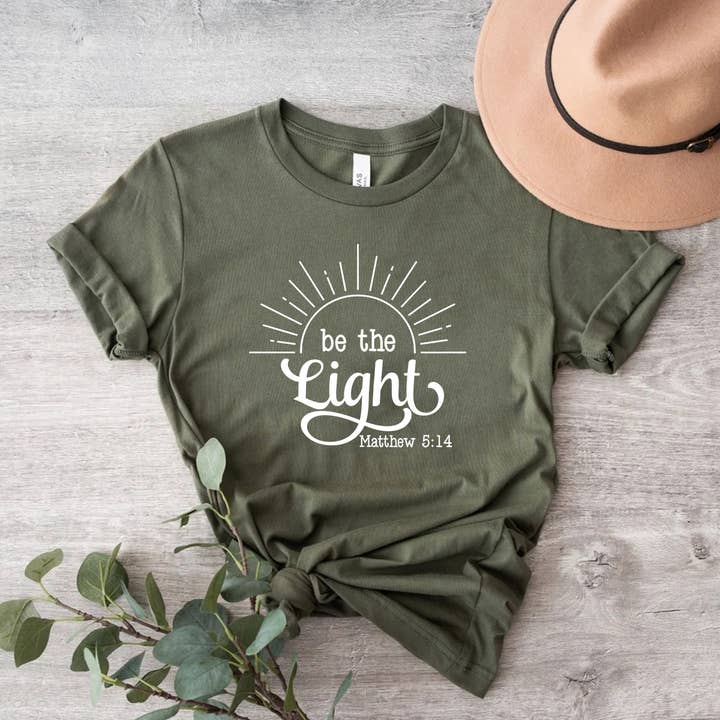 Be The Light Shirt Matthew 5:14 Religious Pray Bible Verse for wholesale by Himalayan Hymns