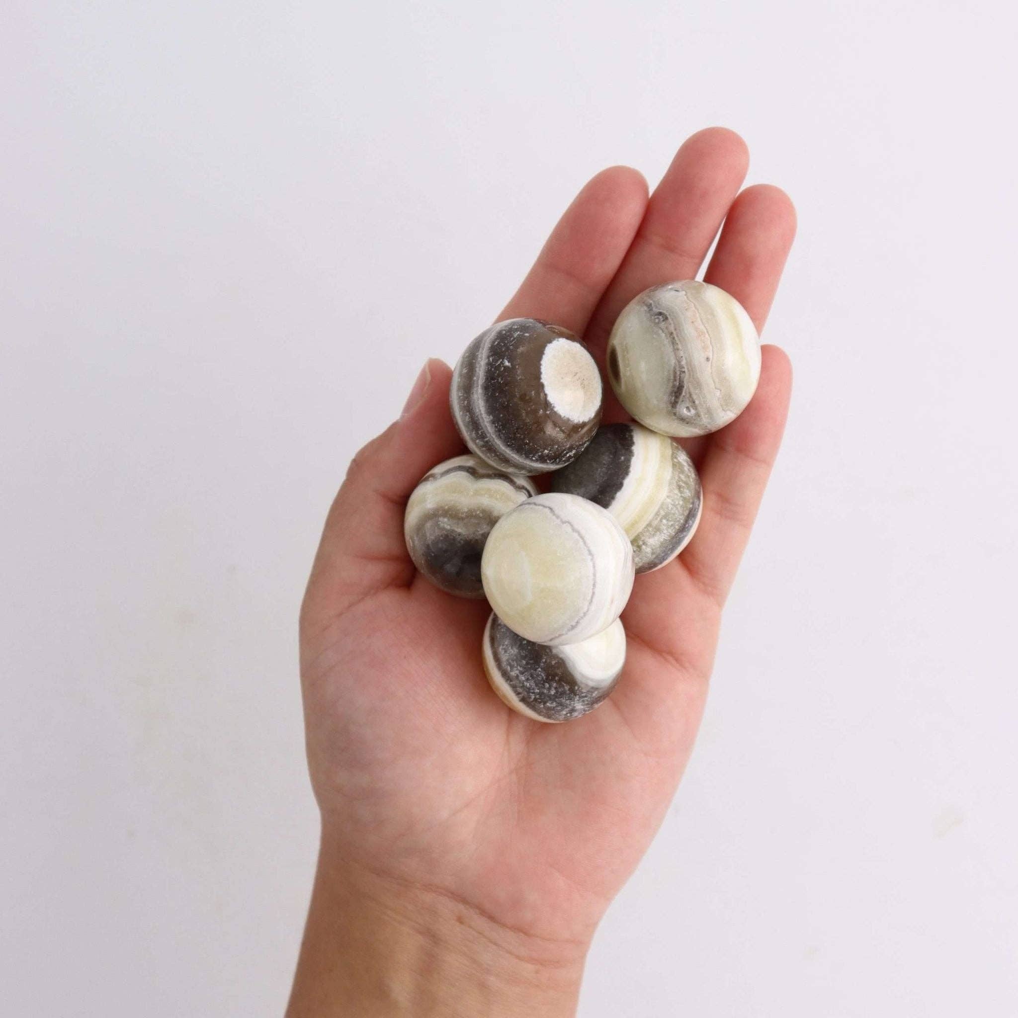 Mi Esperanza Minerals - Venta al por mayor Piedras/cristales espirituales - UNA esfera pequeña de ónix cebra2