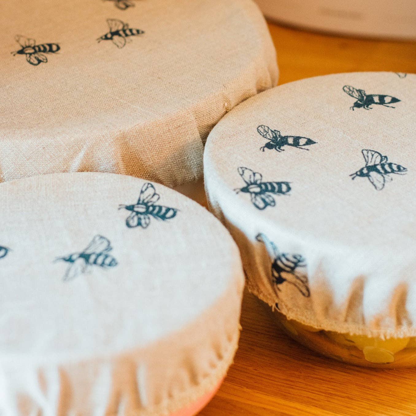 Helen Round - hand printed linen and bamboo wellness – wholesale Food storage wrap/bag – Reusable Linen Bowl Covers With Hand Printed Bee Design4