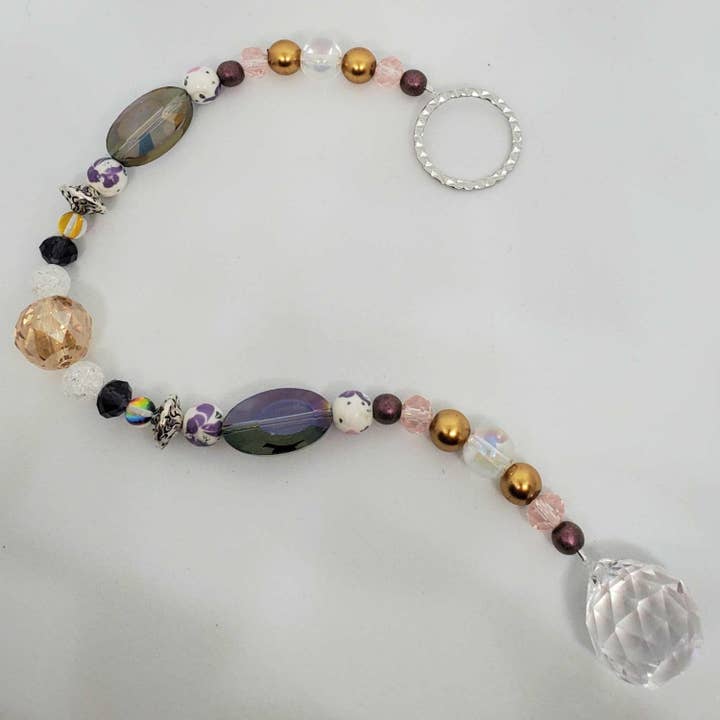 Krystal Solfanger - Lilla Blomstermotiv for engroshandel hos Thorneapple Designs