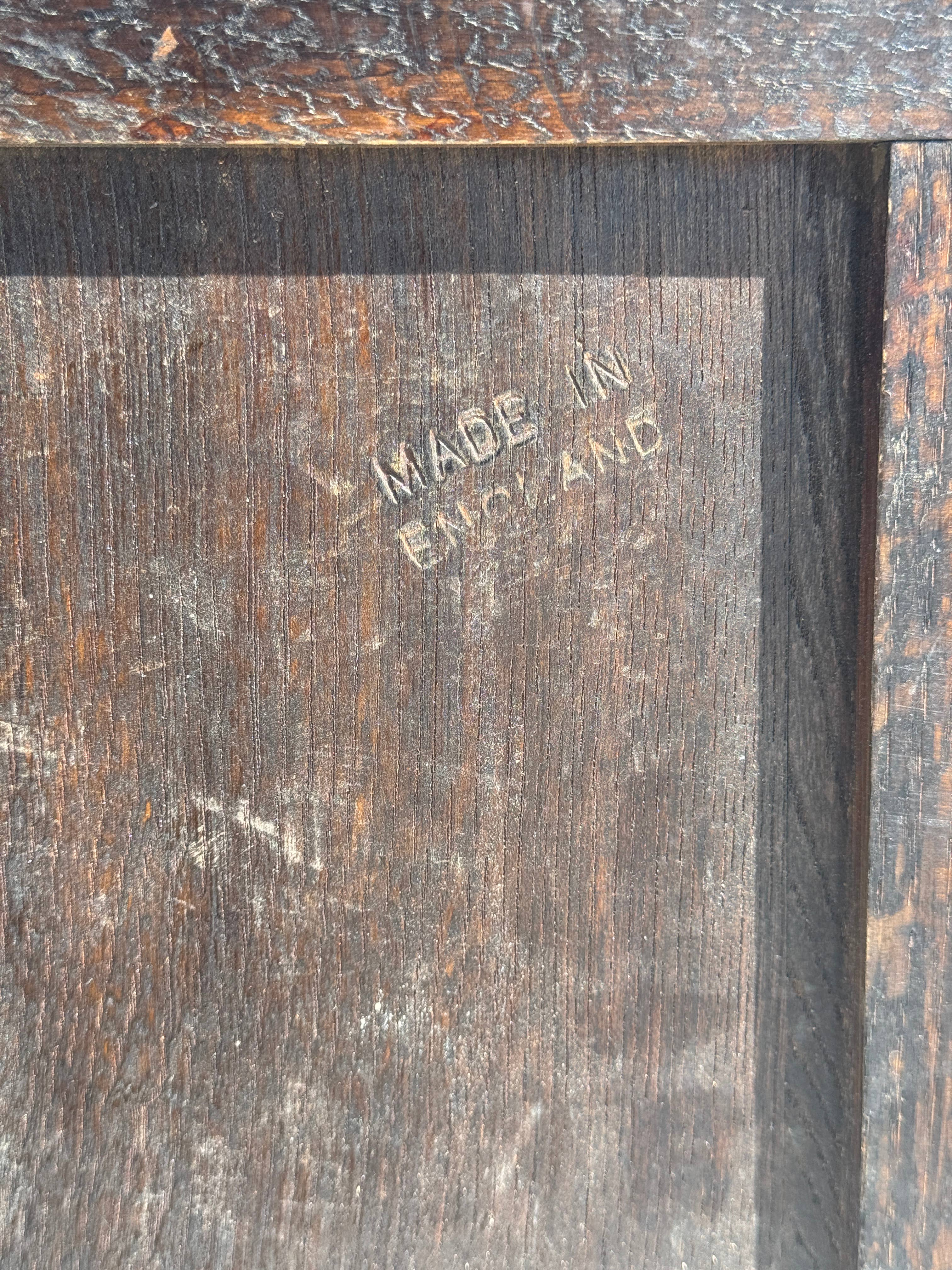 Brown Small antique English rectangular mirror with pediment for wholesale on Faire10