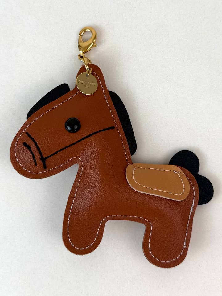 Taskekvast FURY for engroshandel hos Cheeky Chain