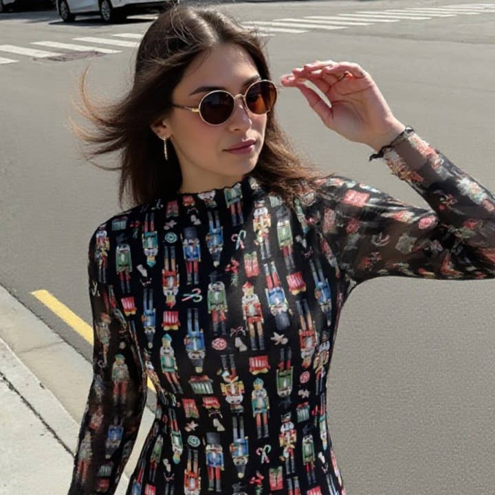 T1509-6687-Alena Nutcracker Soldier Doll Mesh Print Top and other Purchase Wholesale stretch mesh fabric. Free Returns & Net 60 Terms on Faire trending on Faire.