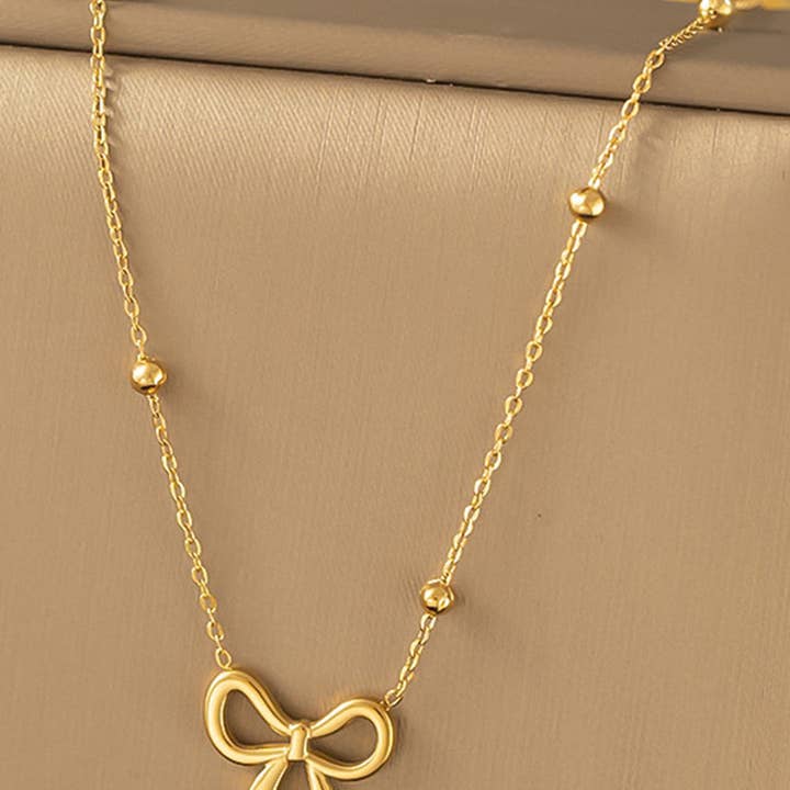 Gold Bowknot Pendant Plated Choker Necklace for wholesale on Faire0