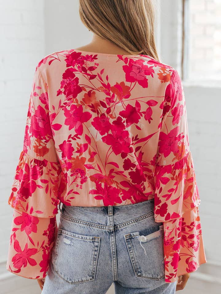 Pink Floral Print Tiered Bell Long Sleeve Buttoned Bodysuit for wholesale on Faire