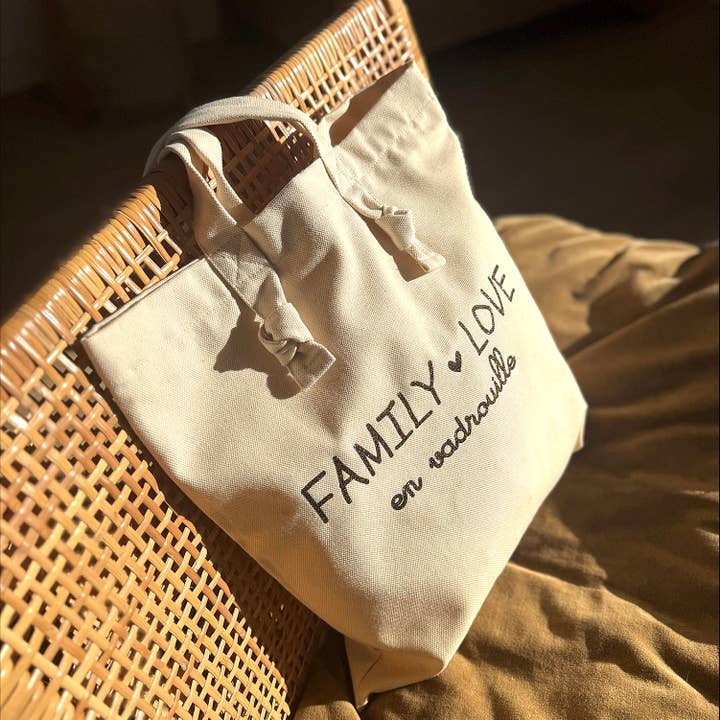 Borsa tote con nodi "Family love en vadrouille" écru per la vendita all'ingrosso da parte di Marcel & Lily