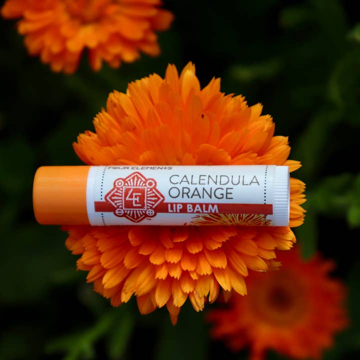 Calendula Orange Lip Balm -.15 oz for wholesale by Four Elements Organic Herbals