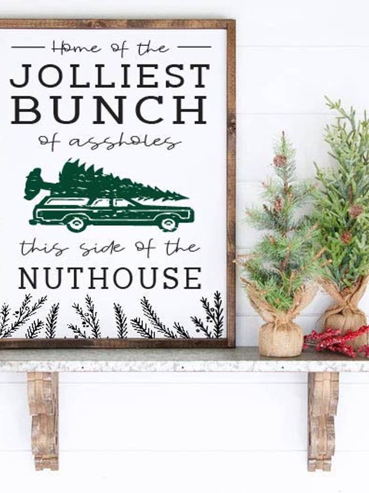 Home of the Jolliest Bunch of Assholes Wooden Framed Sign for wholesale by Willie & Dolly Designs