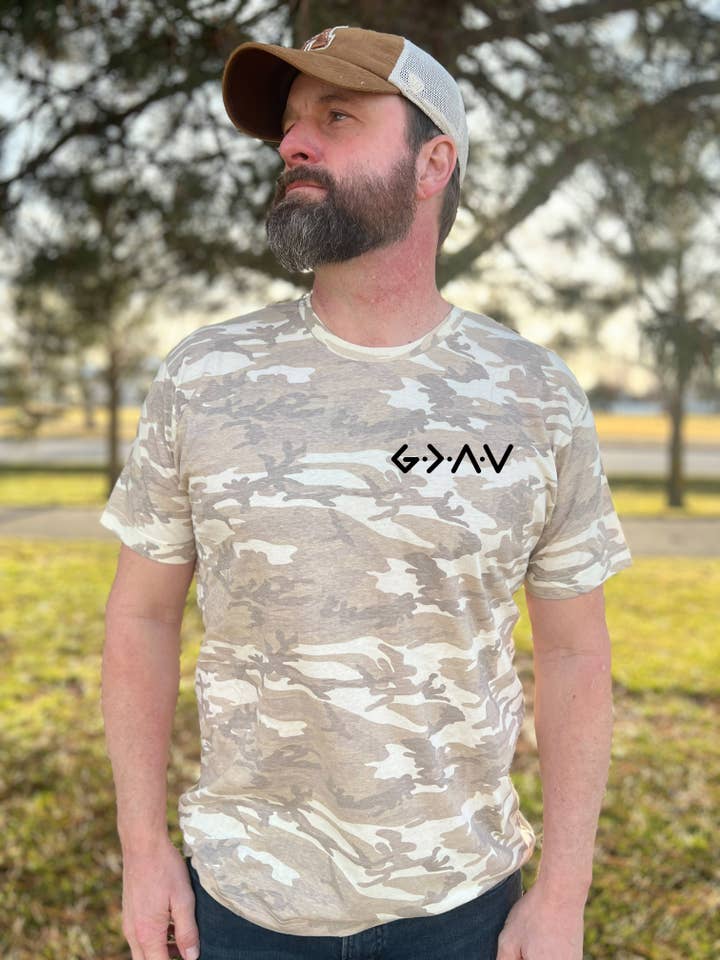 Dwell Apparel - Wholesale Screen Printed T-Shirt - Women's - PUFFY GOD IS GREATER THAN OUR HIGHS AND LOWS UNISEX TEE IN NATURAL CAMO1