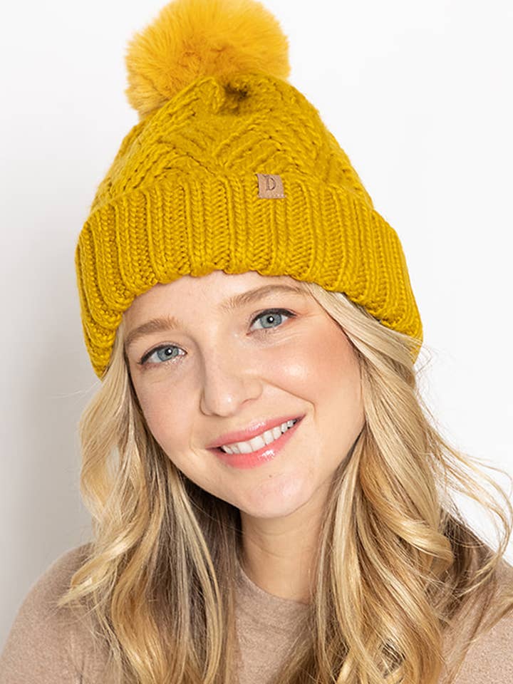 Cable Knit Beanie with Faux Fur Pom for wholesale by Suzie Q USA