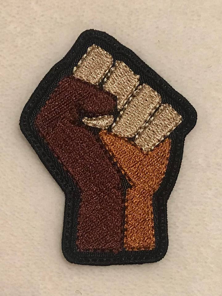 Brown Pride Fist for wholesale by Novel D-Concepts