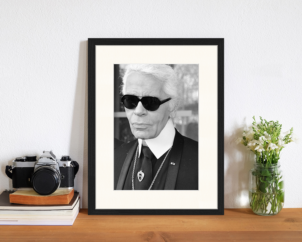 Black Karl Lagerfeld image. Wall art print with frame. for wholesale on Faire2