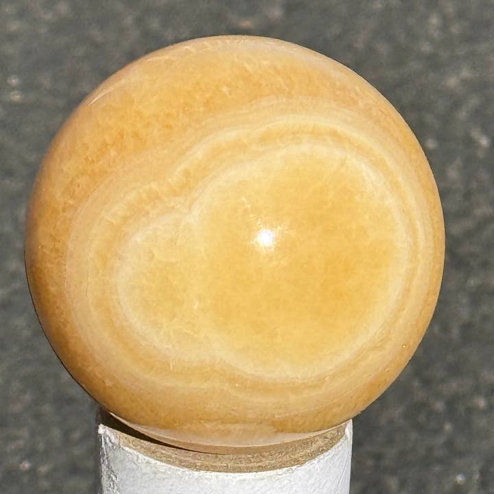 MANGO CALCITE SPHERES 40MM-60MM for wholesale by Metaphysical & Healing Crystals