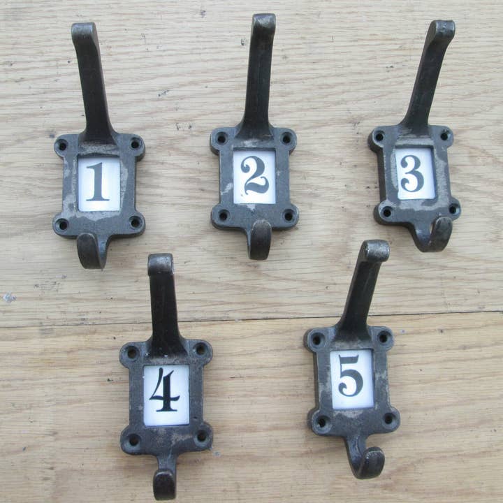 Ceramic Insert 1-5 Numbered Antique Iron Coat Hooks for wholesale by IronmongeryWorld