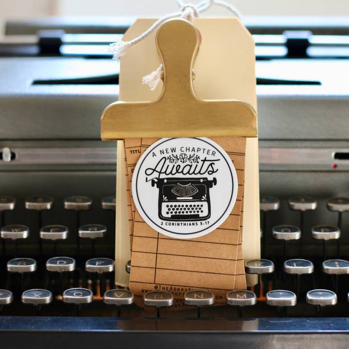 a new chapter awaits - typewriter waterproof vinyl sticker for wholesale by The Adopt Shoppe