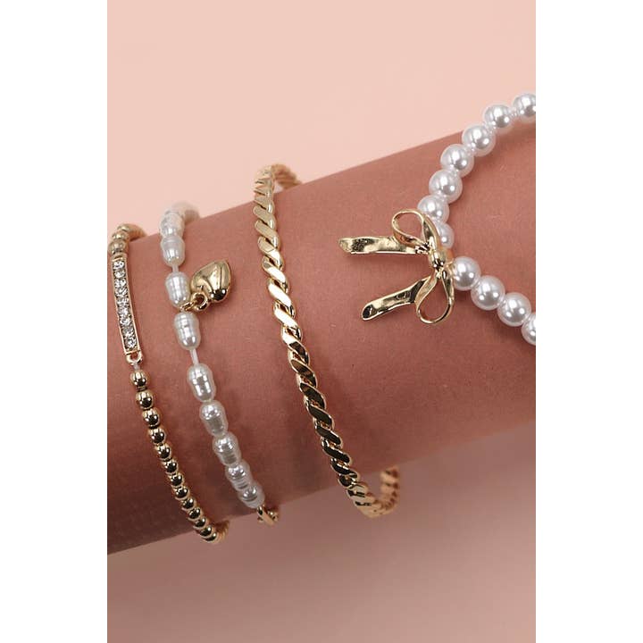 GOLD BOW PEARL RHINESTONE BAR STRETCH BANGLE SET | 80B137 for wholesale on Faire