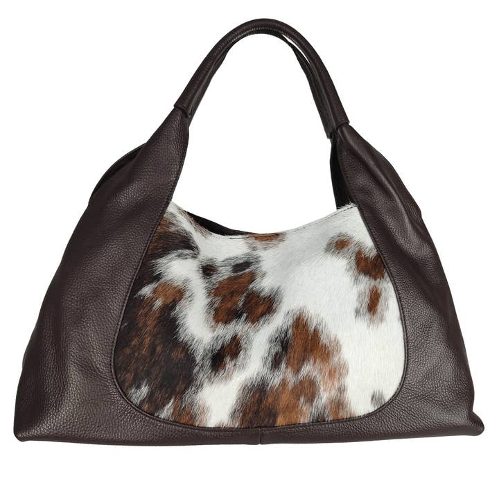 Schoudertas van ponyhaar en leer en andere Pony pack wholesale inkopen. Gratis retourzendingen en een 60-dagen netto betalingstermijn op Faire.com trends op Faire.