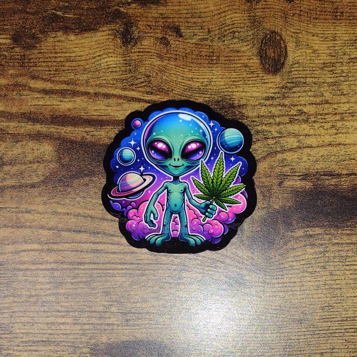Dancing Dolphin Crafts - Wholesale Sticker - Galactic Green: Cosmic Cannabis Enthusiast Vinyl Sticker1