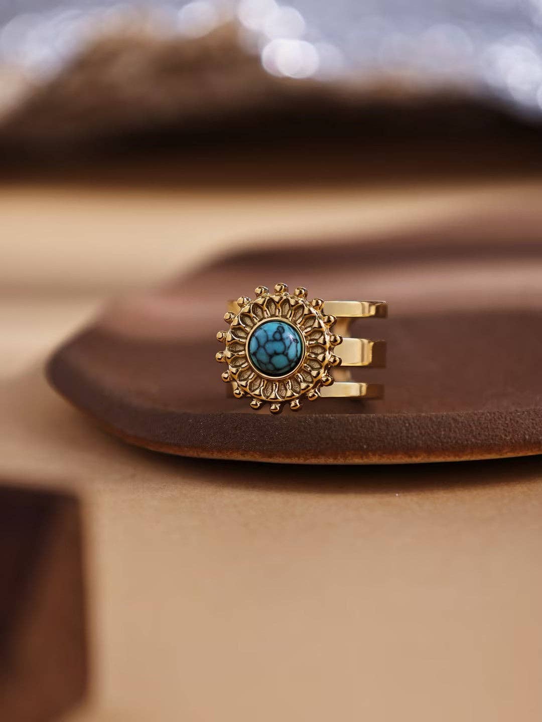 Revelari – wholesale Cocktail/statement ring – Gold Ring with Sunflower Design and Green Gemstone5