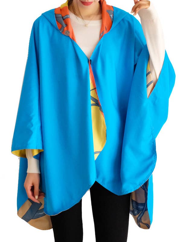 Winding River - Vente Imperméable – femme - Cape de pluie réversible équestre turq/orange - Swirling Horse1