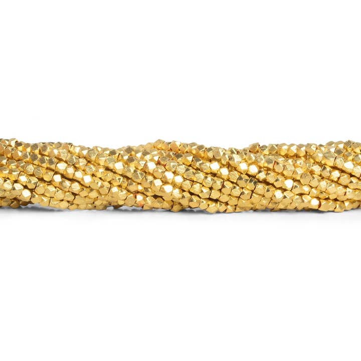 2.2mm 22kt Gold Plated Brushed Faceted Nugget Beads 8 inch 81 beads for wholesale by The Bead Traders