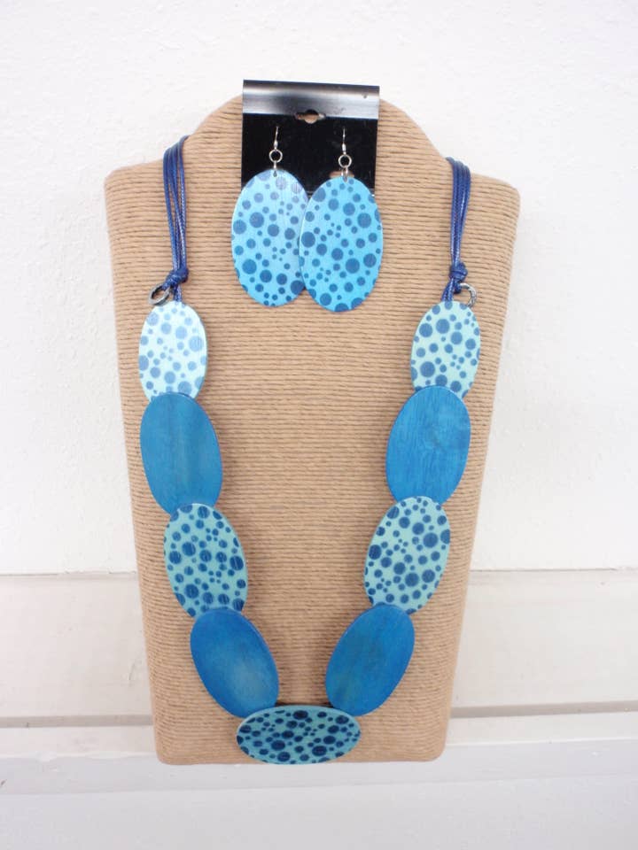 CORDÓN DE CERA AZUL AJUSTABLE CON MADERA OVALADA EN DOS TONOS DE AZUL para venta al por mayor de International Duru's