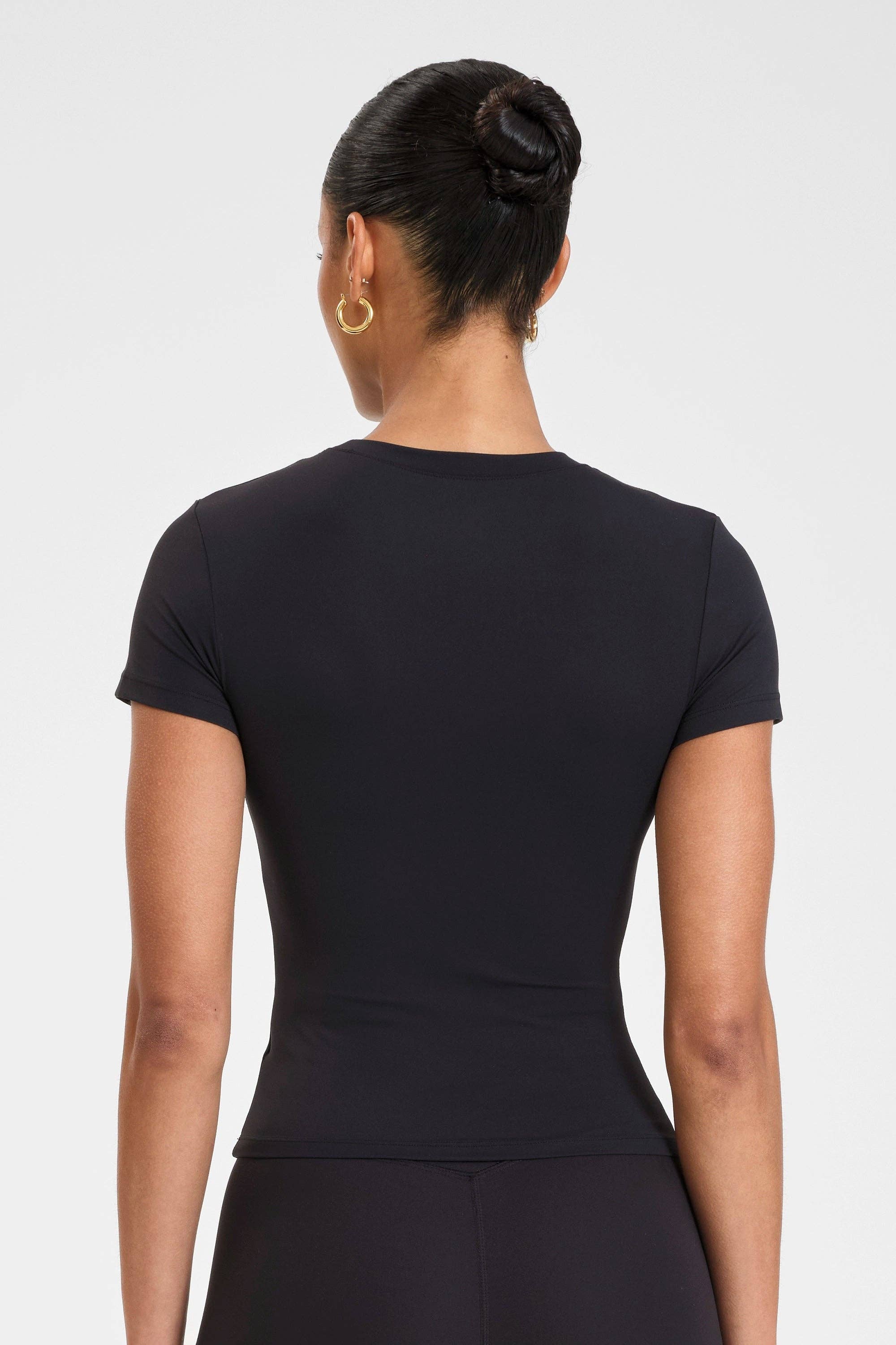 Black ALLFENIX CloudCore Lite Tee for wholesale on Faire1