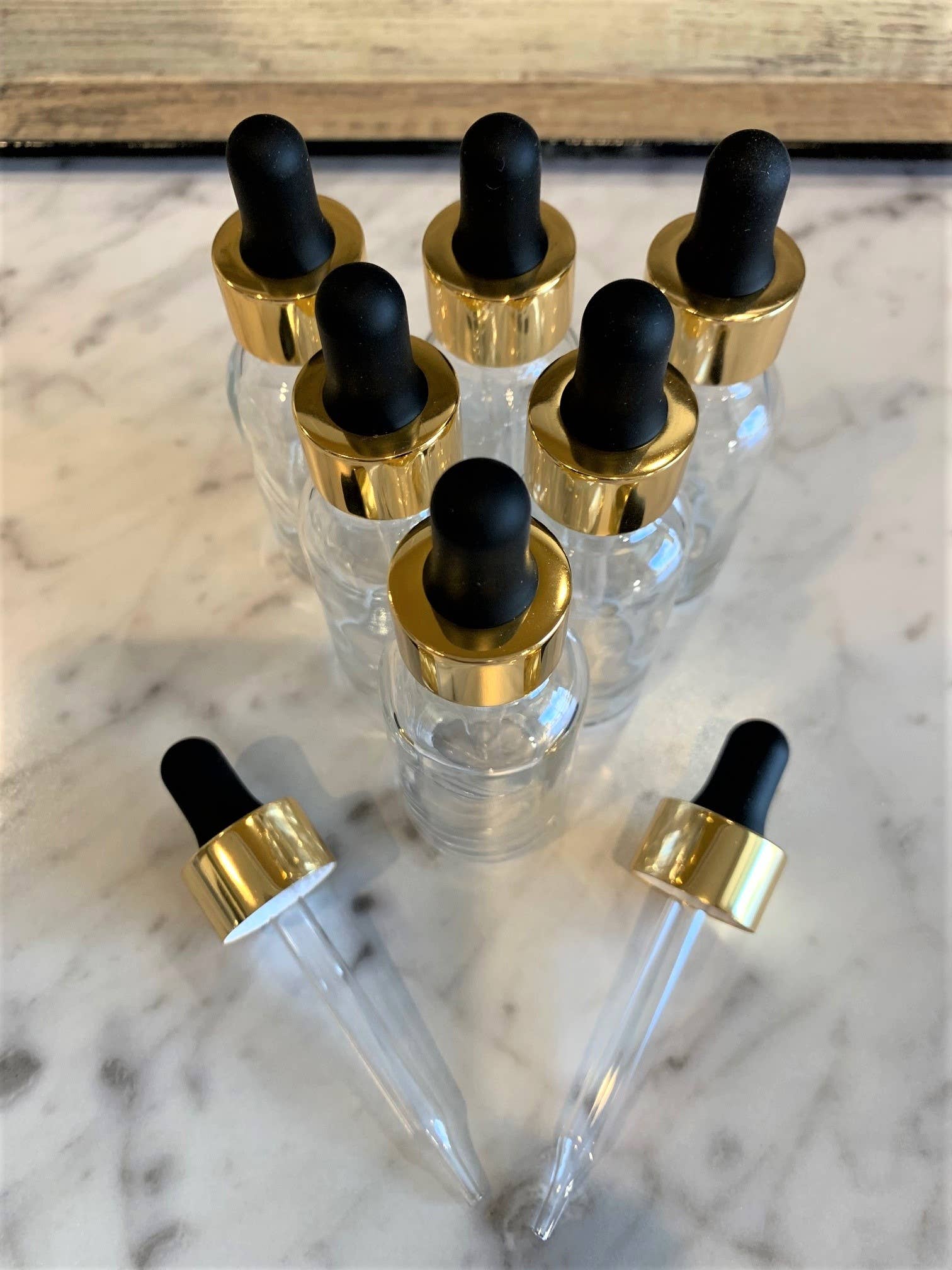 The Bottle Shoppe - Wholesale Essential Oil Holder - 1oz Clear Glass Bottle with Black and Gold Glass Dropper6