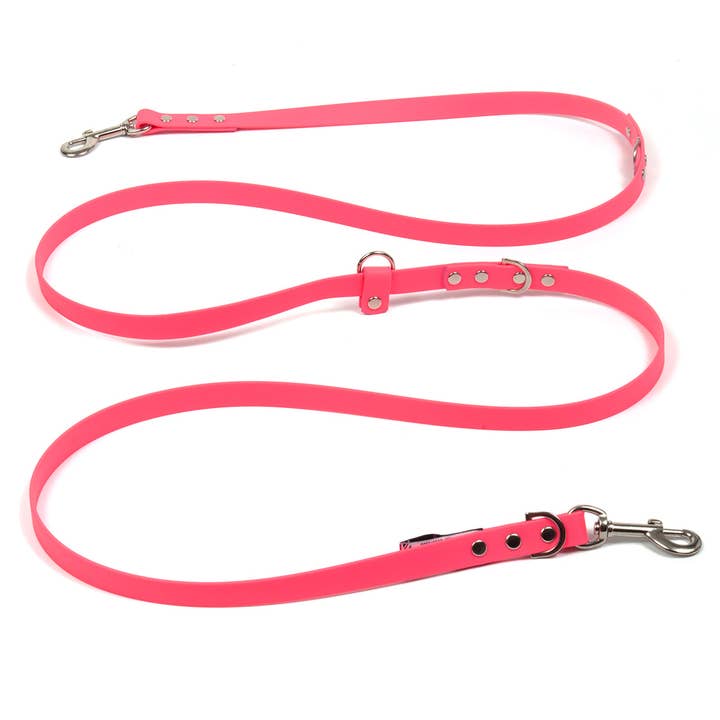 Guinzaglio per cani a mani libere in biothane rosso in pelle vegana di colore rosa brillante per la vendita all'ingrosso da parte di Creature Clothes