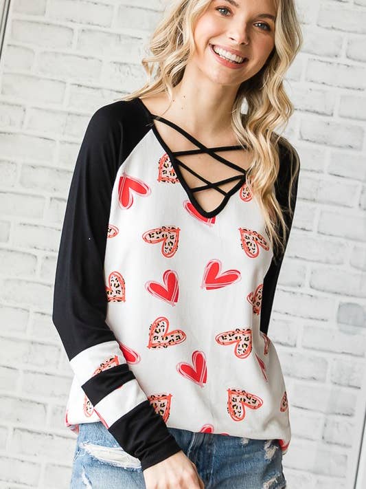 LONG SLEEVE V NECK CRISSCROSS HEART PRINT TOP for wholesale by Pink Irene Wholesale