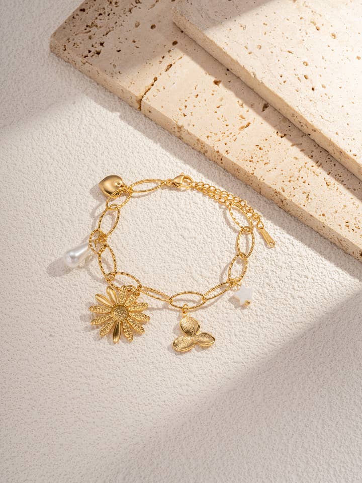 Flower, star, heart charm bracelet in stainless steel for wholesale by COSMOS