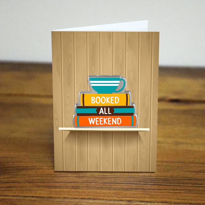 Booked all weekend stack of books with tea cup enamel pin for wholesale by Lifebeats Gifts