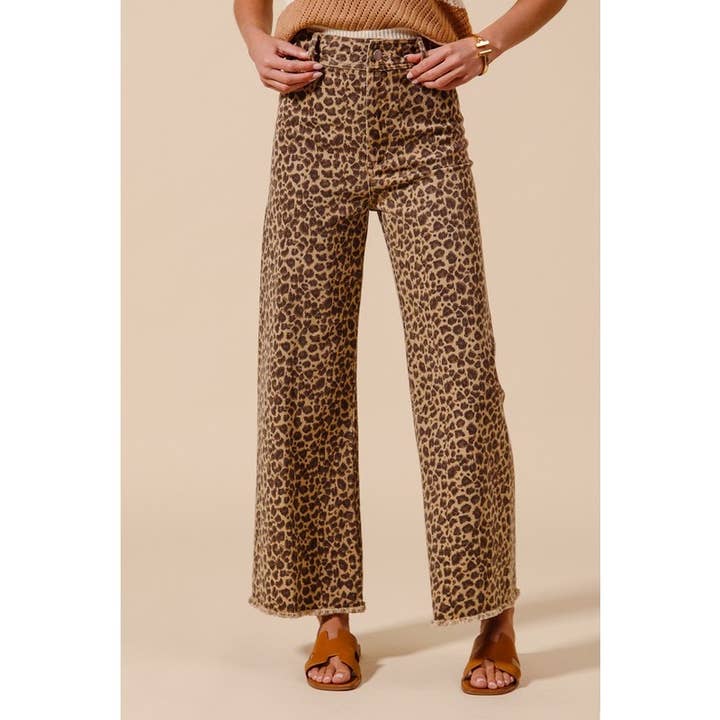 MID RISE LEOPARD DENIM FRAYED HEM WIDE LEG PANT for wholesale on Faire