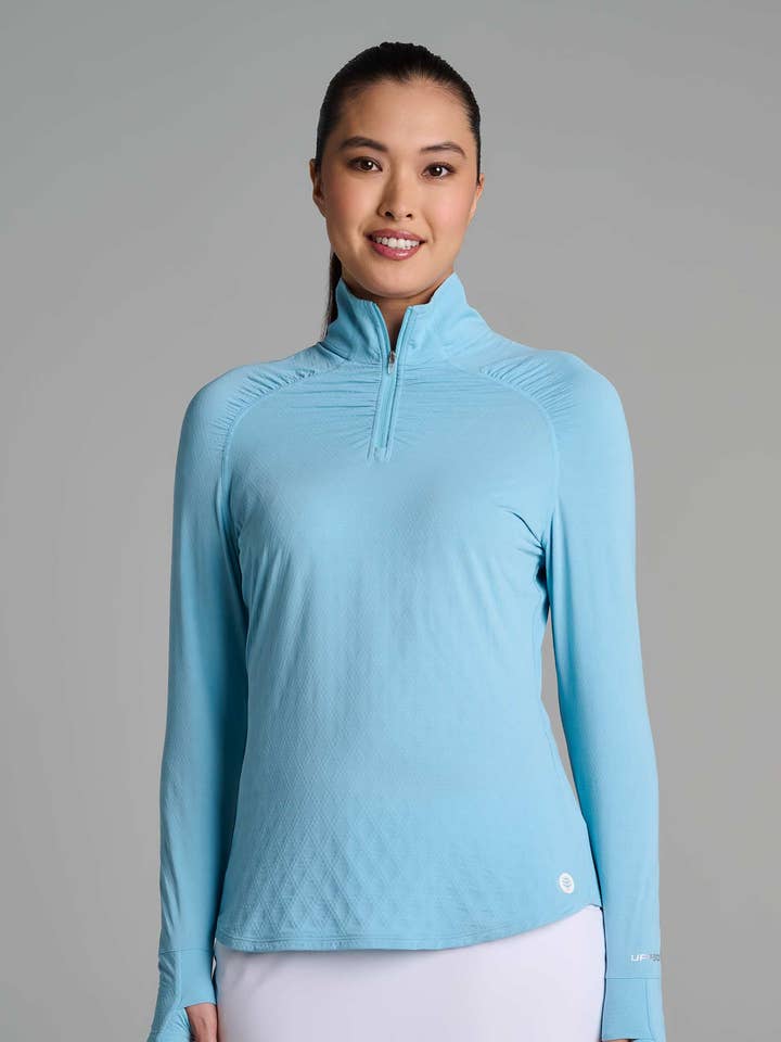 Women's Golf Quarter-Zip Sun Shirt | Arctic Blue Diamond Jacquard for wholesale by Coolibar