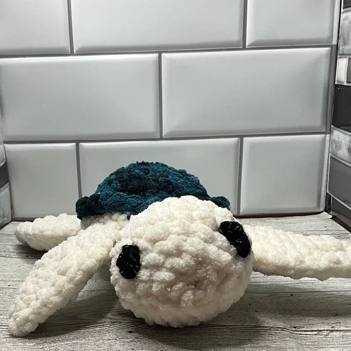Turtle plush with crochet eyes for wholesale by Kawaii Kat Studios