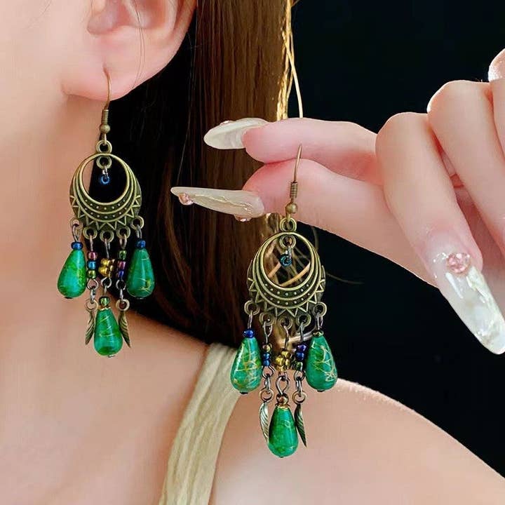 Stylish Tassel Pendant Earrings With Hollow Design for wholesale by Ekartini